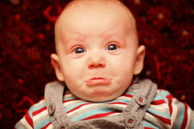 Pouting baby about to cry
